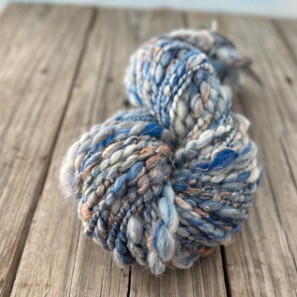 Handspun Art Yarn, Thick & Thin Spiral Plied, Sparkly Sky blue silver, merino wool stellina sparkle, 78 yards