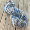 Handspun Art Yarn, Thick & Thin Spiral Plied, Sparkly Sky blue silver, merino wool stellina sparkle, 78 yards