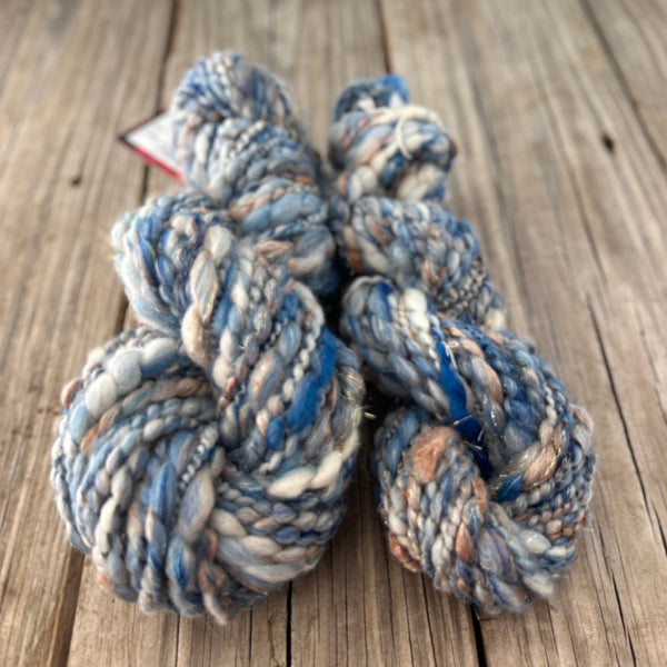 Handspun Art Yarn, Thick & Thin Spiral Plied, Sparkly Sky blue silver, merino wool stellina sparkle, 78 yards